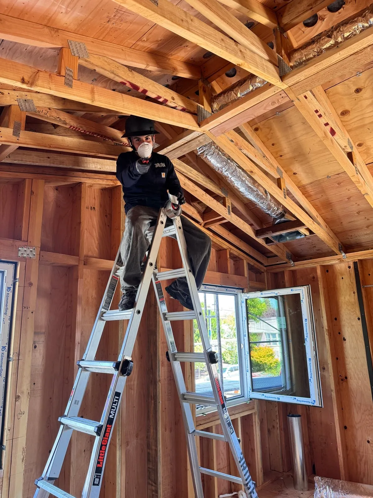 3RDGEN technician on a Bay Area job site installing ductwork in a home under construction