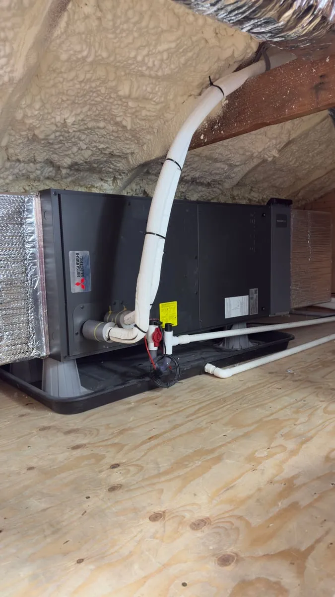Mitsubishi Electric air handler installed in an insulated attic with sealed duct connections